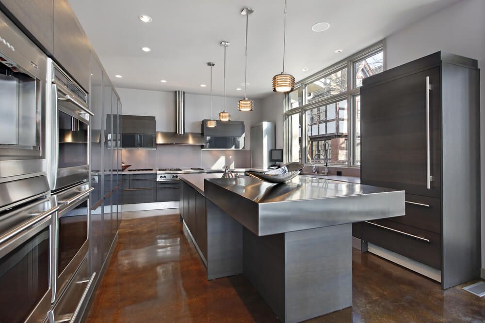 Luxury kitchen with stainless steel appliances and island