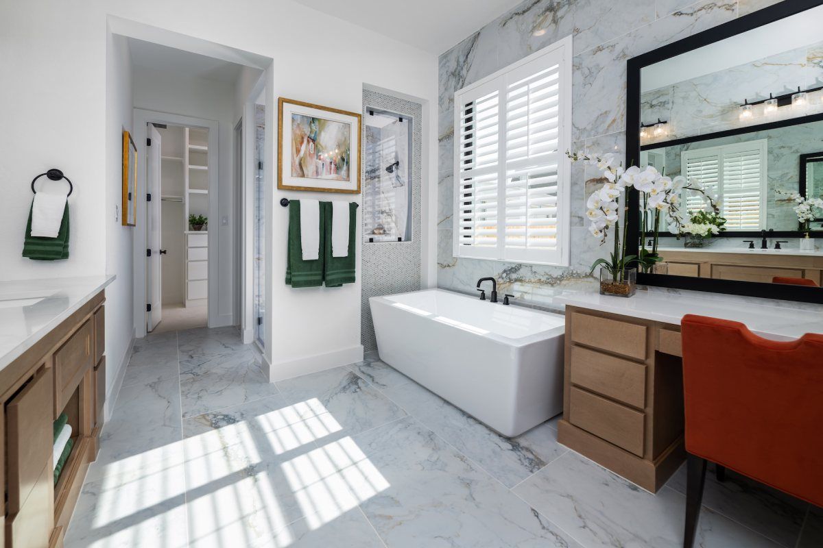 bathroom with open shutters letting the light in