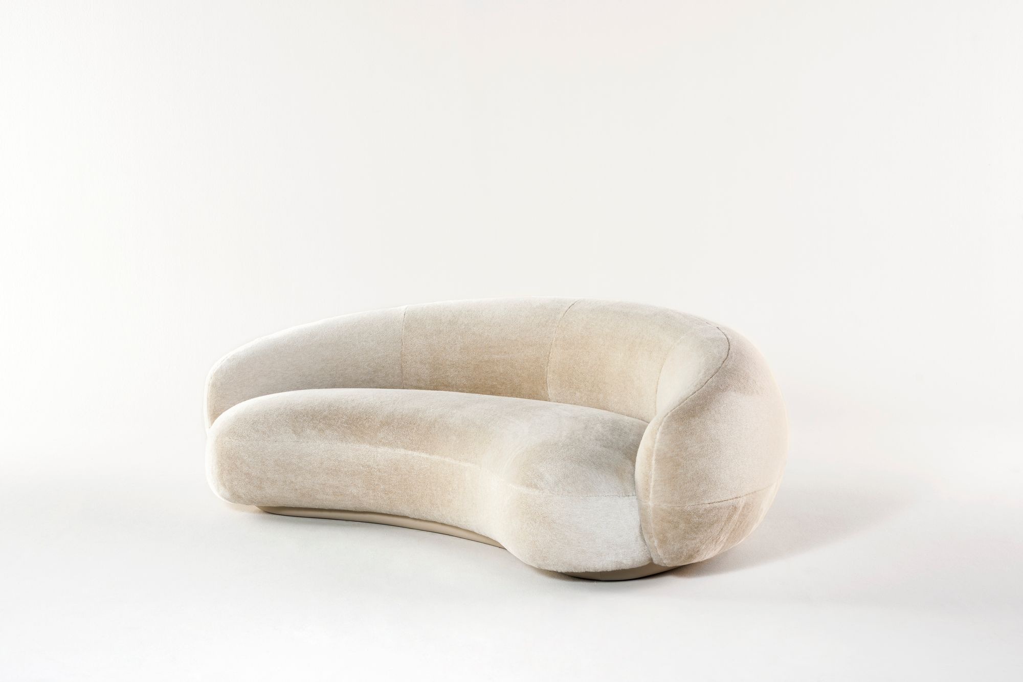 bean shaped cream velvet sofa