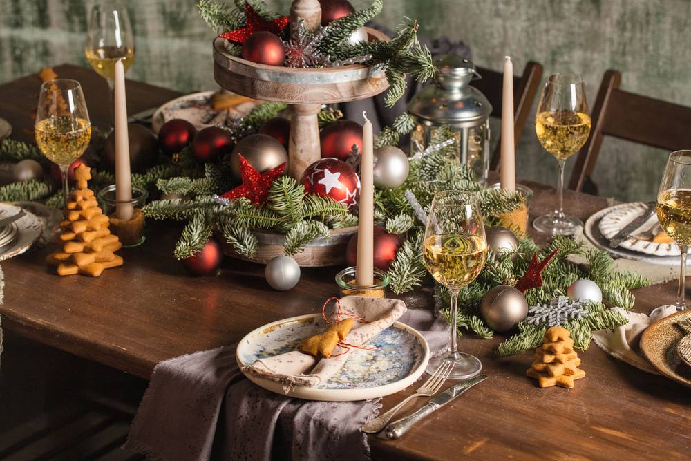 Elaborate christmas dinner table with twigs and decorations