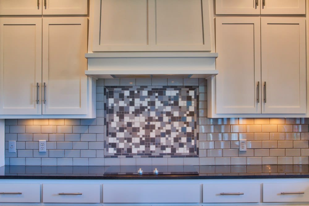 kitchen backsplash with two diffent tile styles
