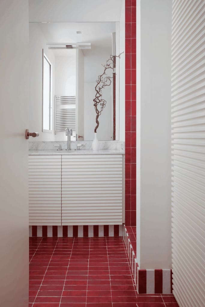 white and red tiled bathroom 