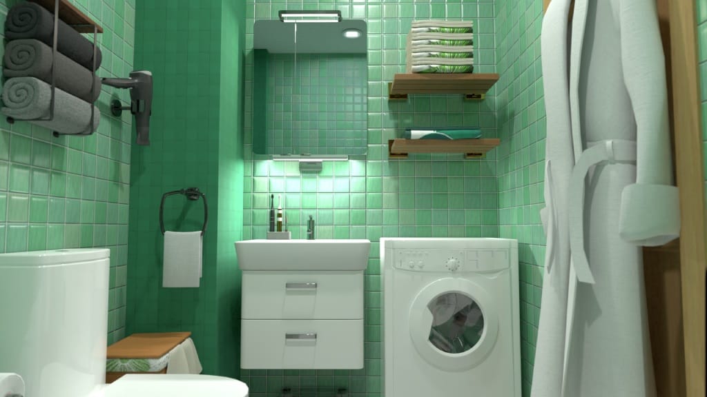 Salle de bains avec carrelage vert et appareils électroménagers blancs