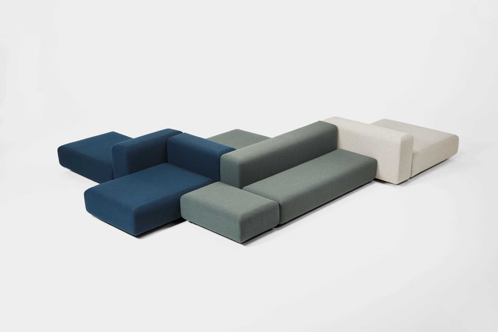 sofá modular de diseño moderno de colores azules, grises blanco