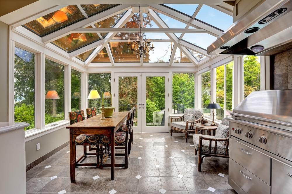 Sun-room patio area with glass vaulted ceiling