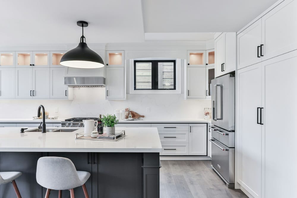 white kitchen with multifuncional island