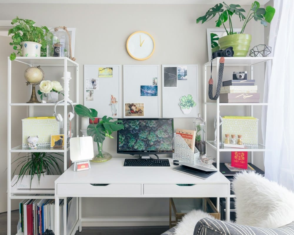 white desk and shelves in a home office
