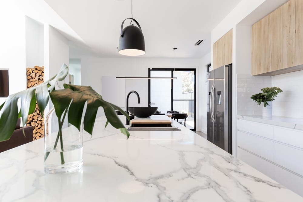 modern kitchen renovation with white marble countertop