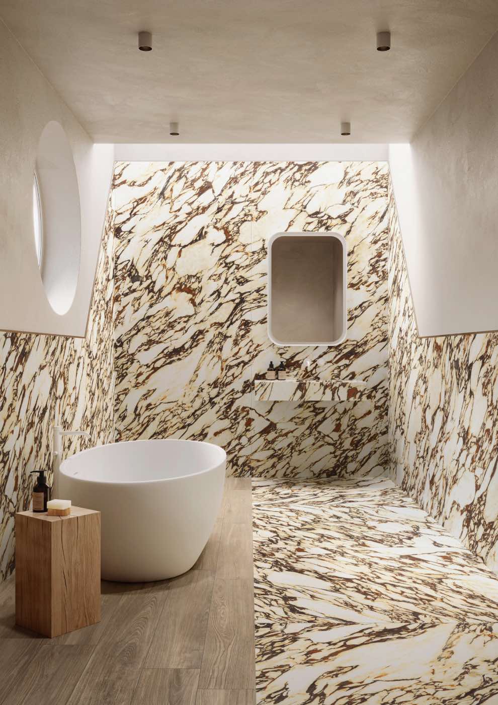 cuarto de baño moderno de mármol con bañera y mueble de baño de mármol