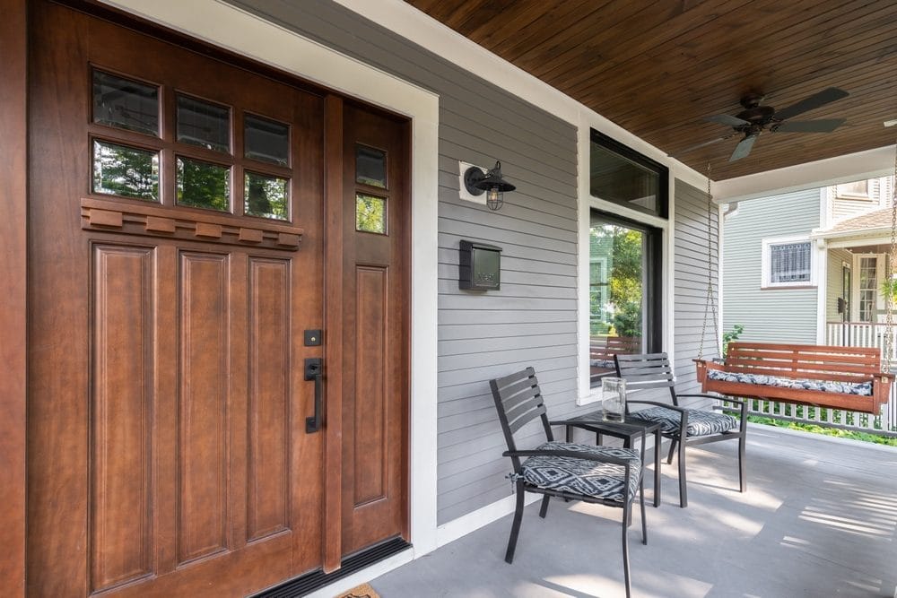 front porch with seating set and a swing