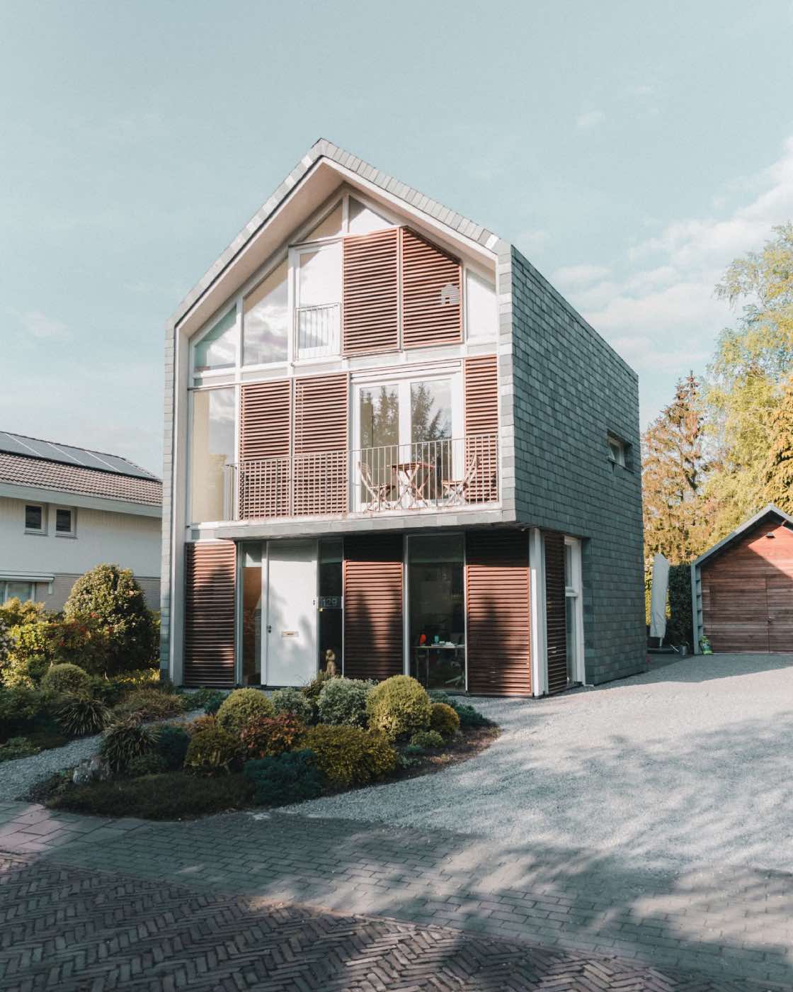 modern home with small front garden and patio