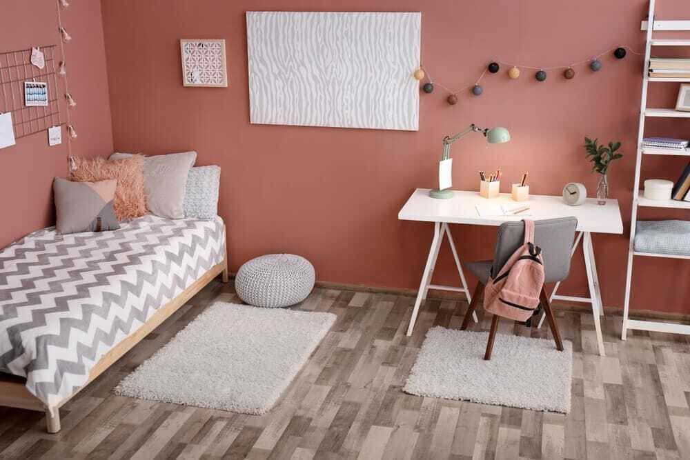 Projeto de quarto infantil com área de estudos