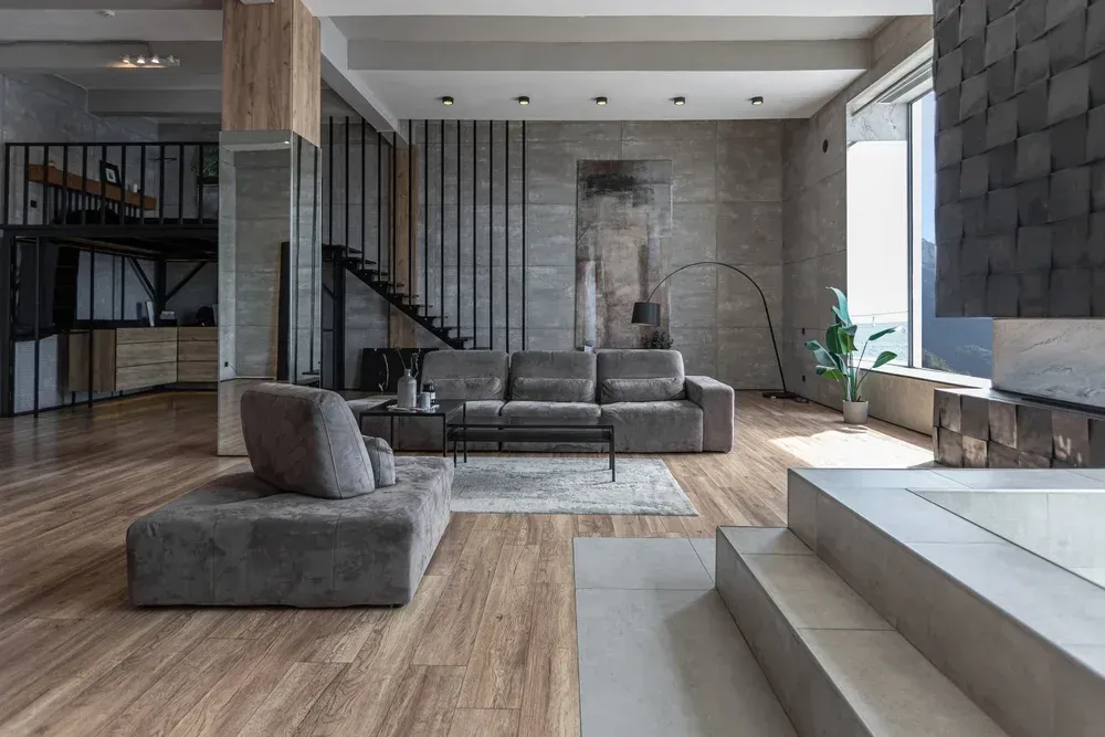 apartamento tipo loft estilo industrial con escaleras y hormigón