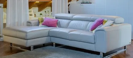 Grey sectional sofa provided by the clients as a reference for the living room layout