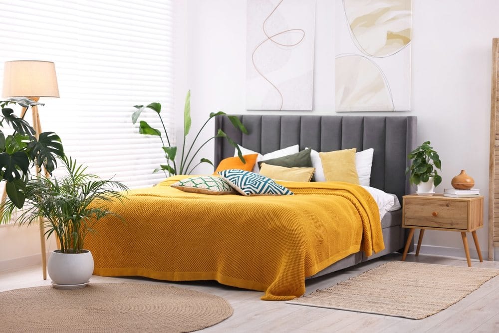 Bedroom fabrics and bedding | New Africa/Shutterstock