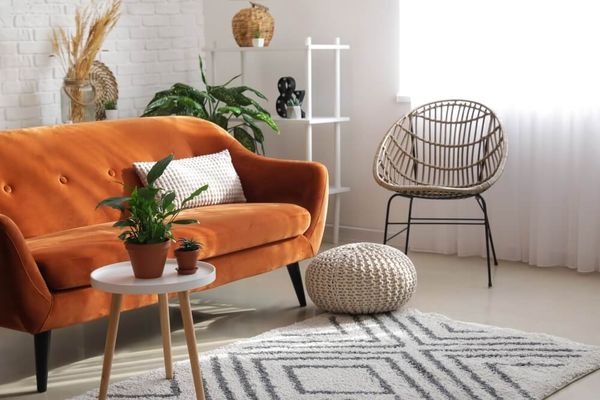 orange sofa in a modern apartment 